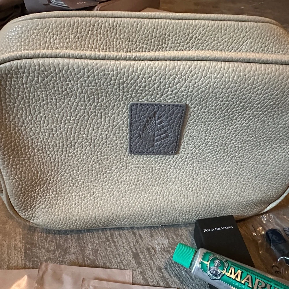 Exclusive Four seasons private jet experience duffel and toiletry kit.  BNWT